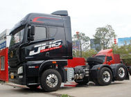 شاحنة جرار لون أسود مع إطارات 295 / 80R22.5 و 115 كم / ساعة السرعة القصوى