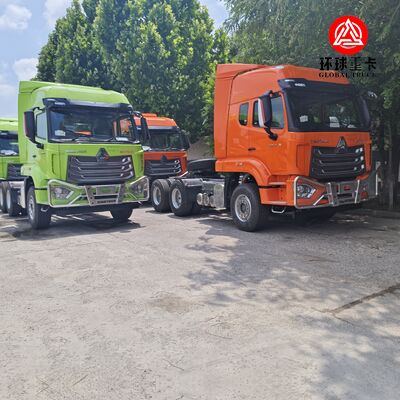 سيارة HOWO NX جديدة تمامًا 6x4 430HP محرك اليد اليمنى جرار شاحنة رئيسية للمحركات لتنزانيا اللوجستيات